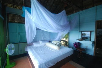 Chambre romantique avec moustiquaire 